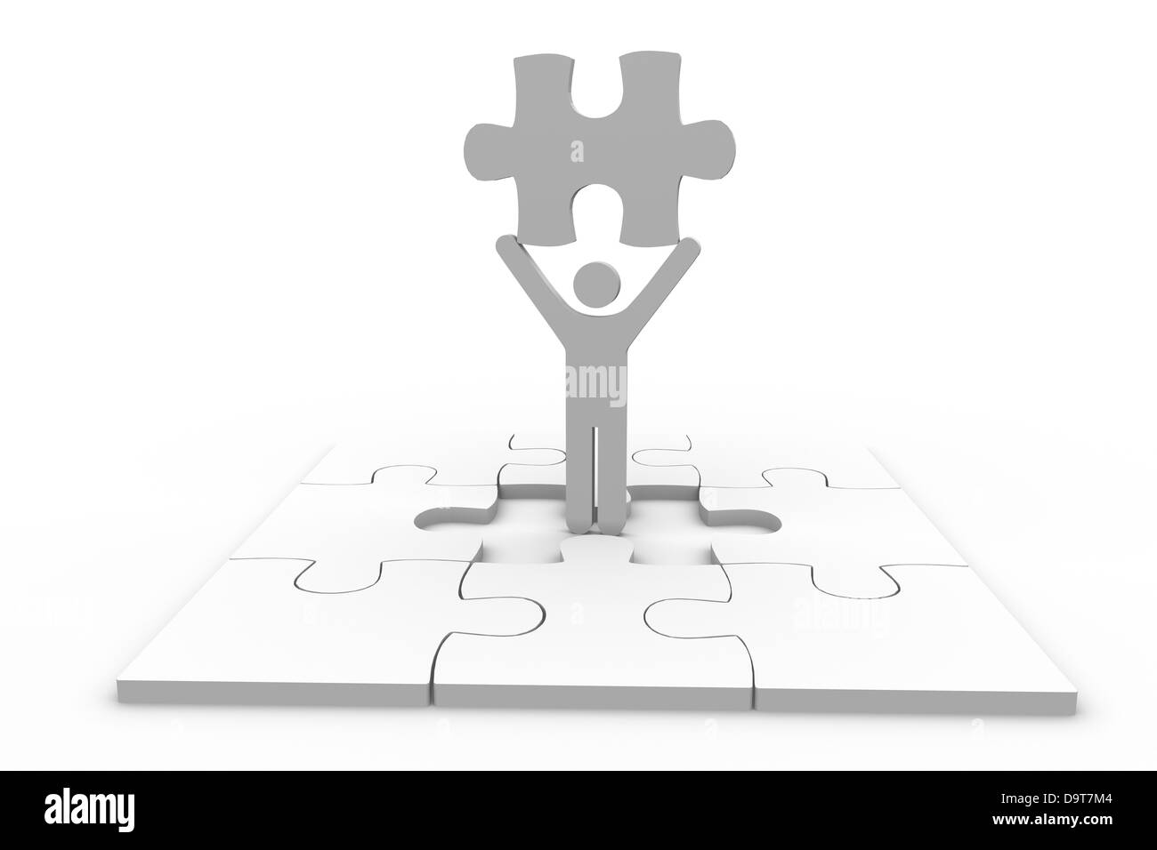 Human representation holding jigsaw piece over unfinished puzzle Stock Photo