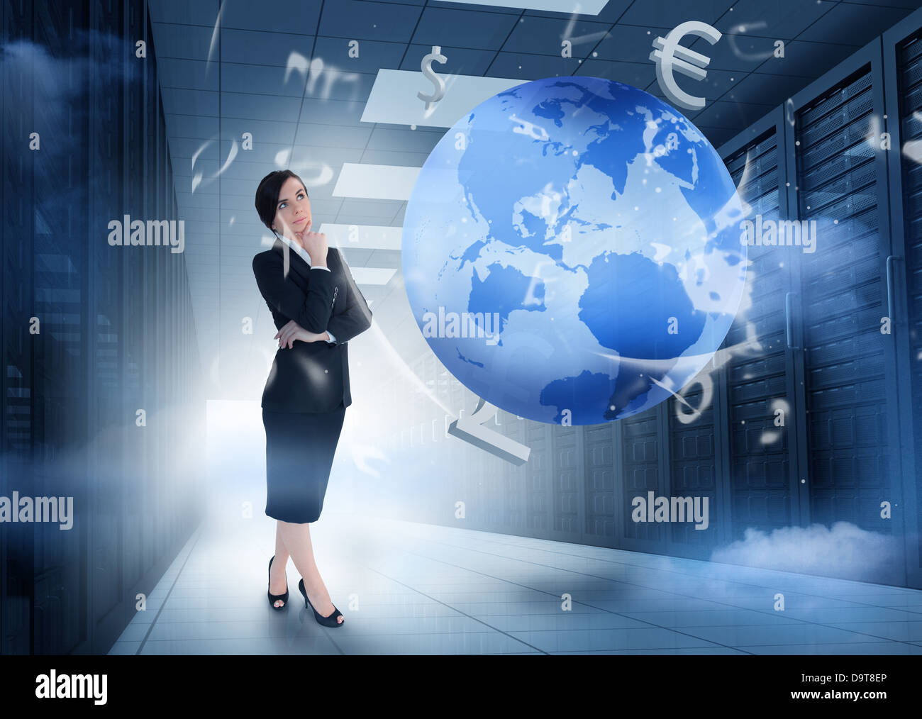 Businesswoman standing in data center with earth and currency graphics Stock Photo
