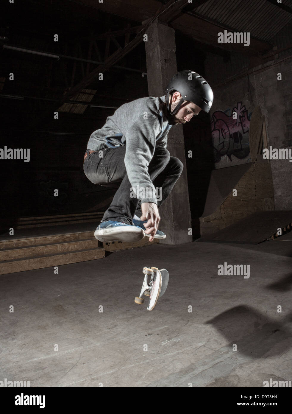 Skater doing 360 trick Stock Photo