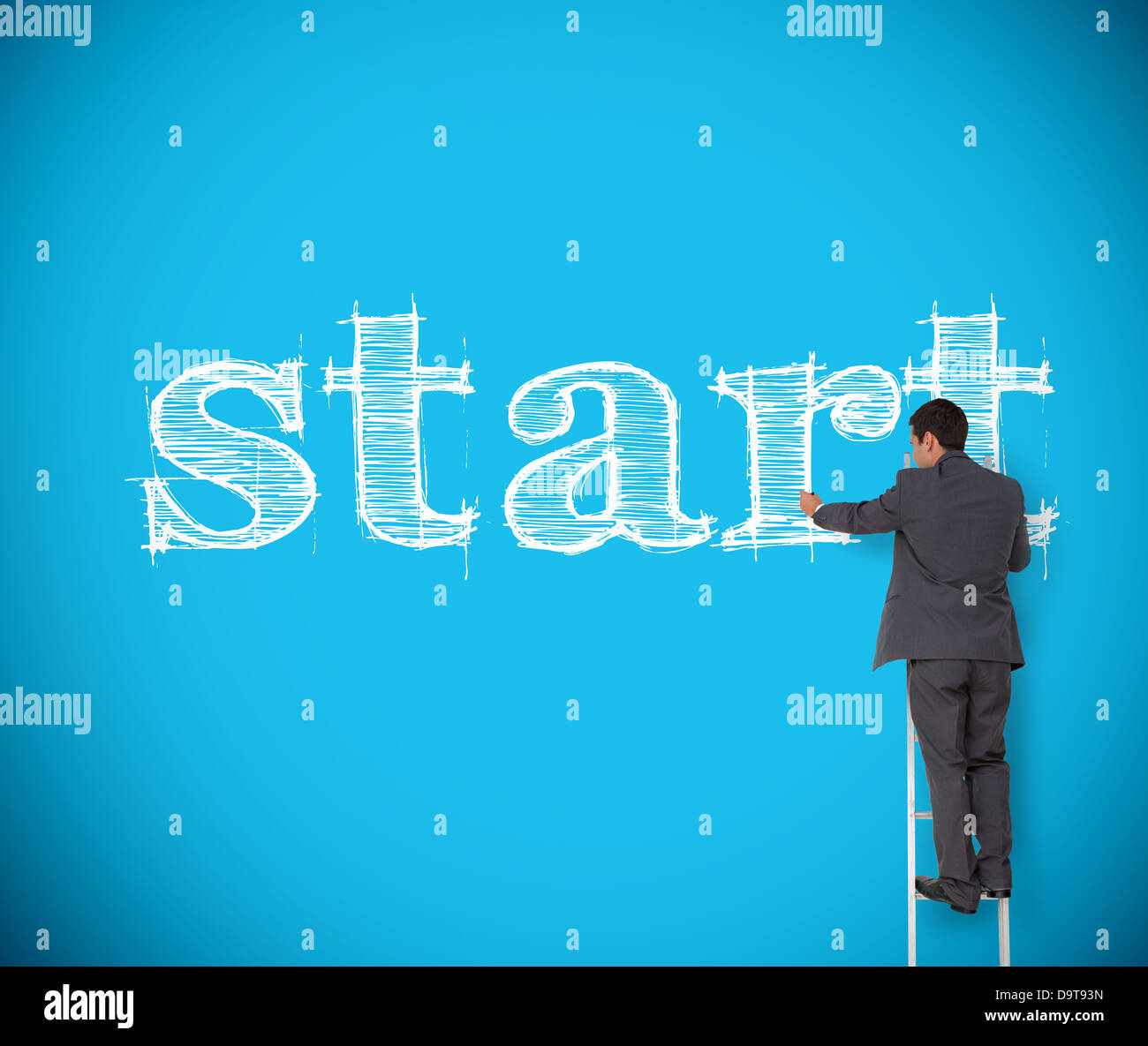 Businessman writing start with chalk Stock Photo