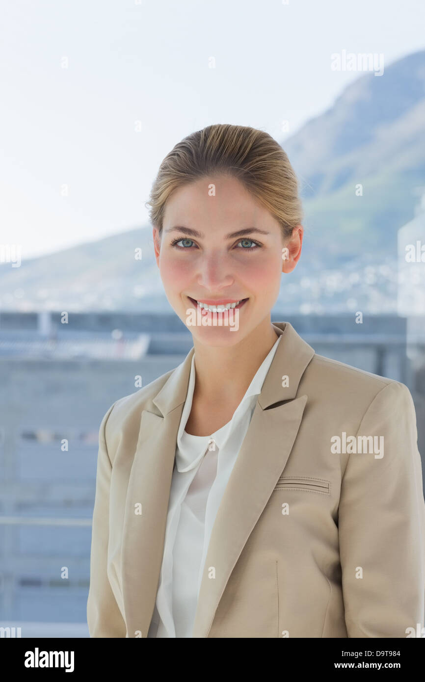 Portrait of a smiling businesswoman in a modern office Stock Photo - Alamy