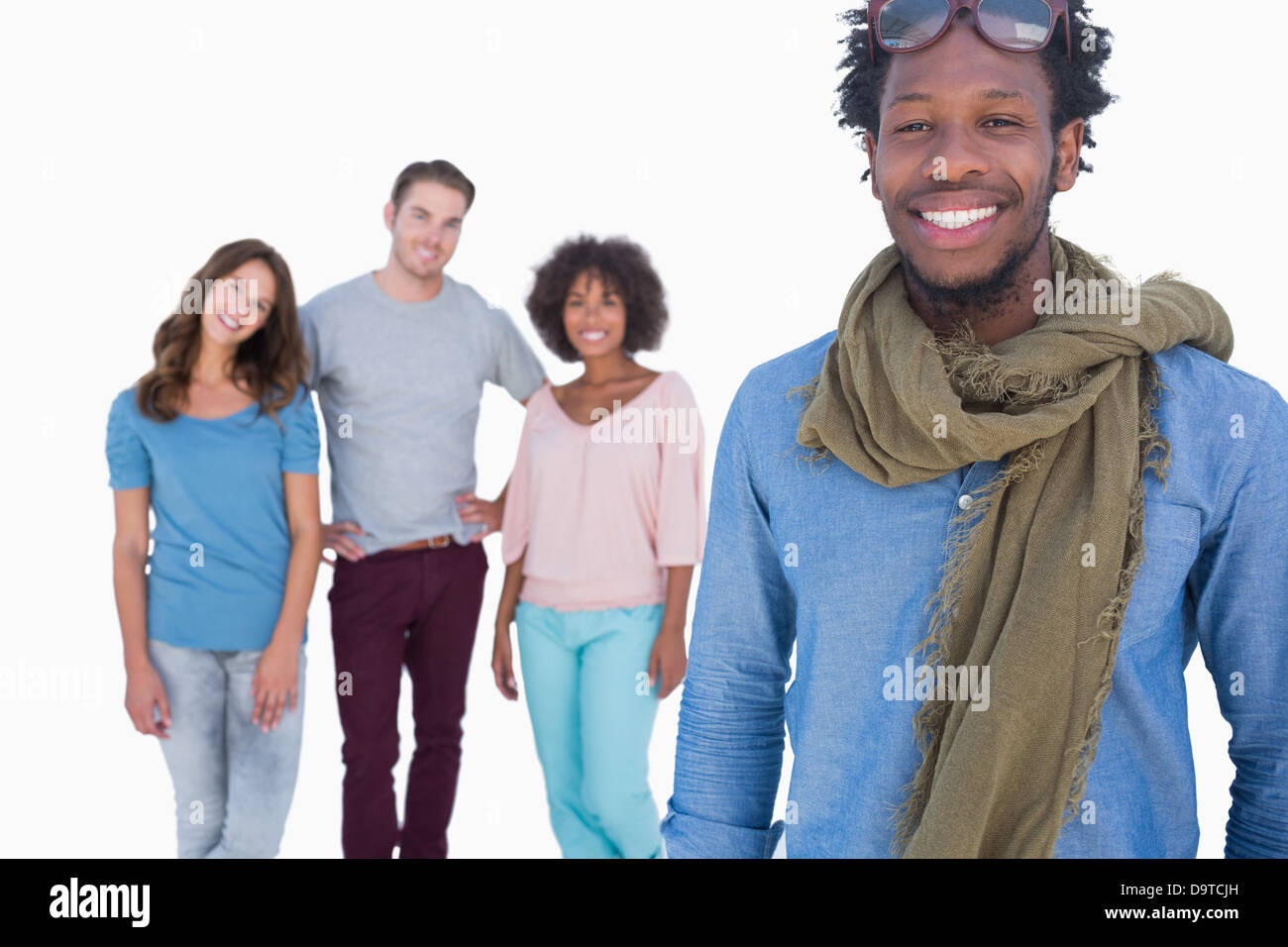Fashion man standing in front of others young people Stock Photo