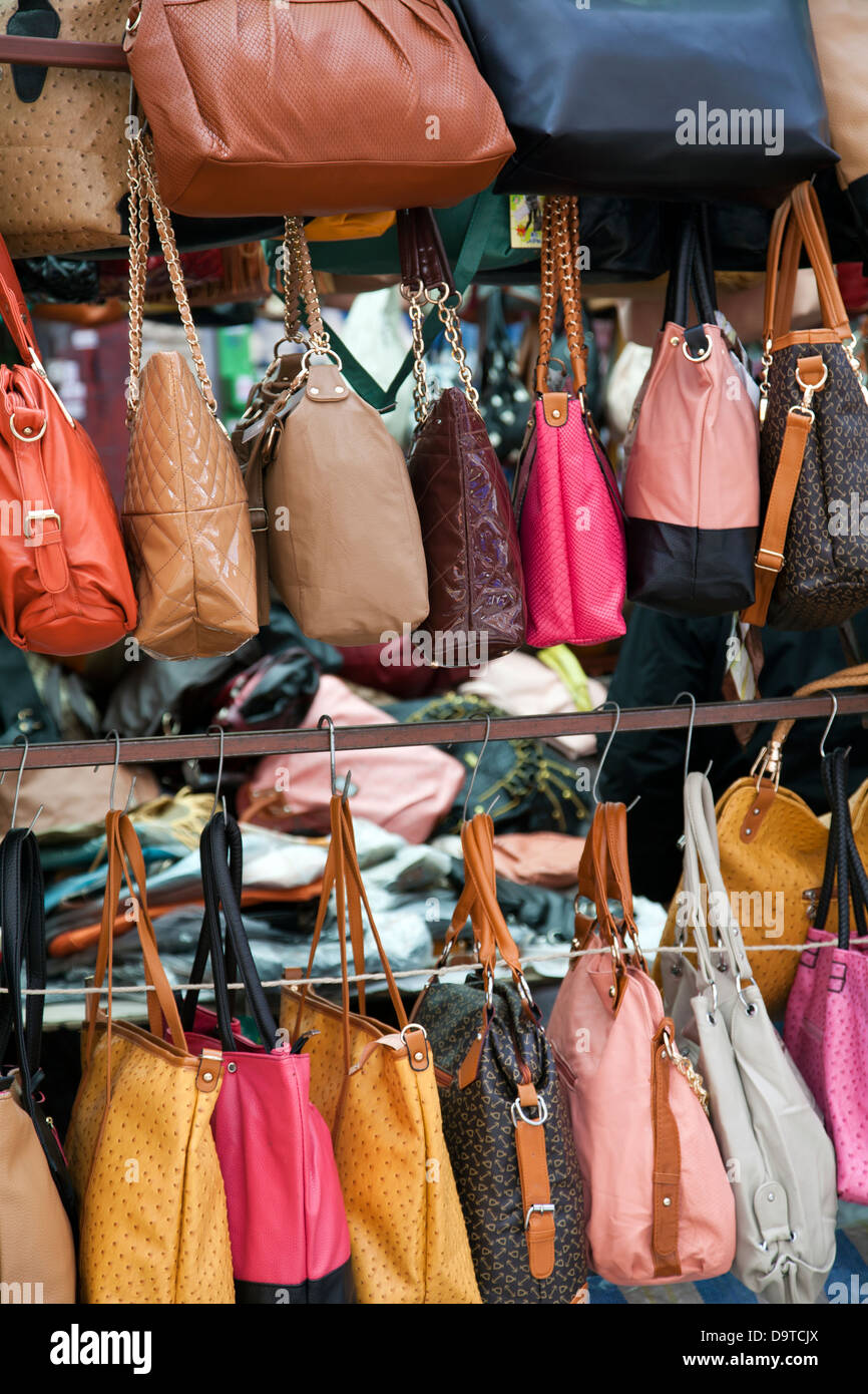 Handbags handbag market stall hi-res stock photography and images - Alamy
