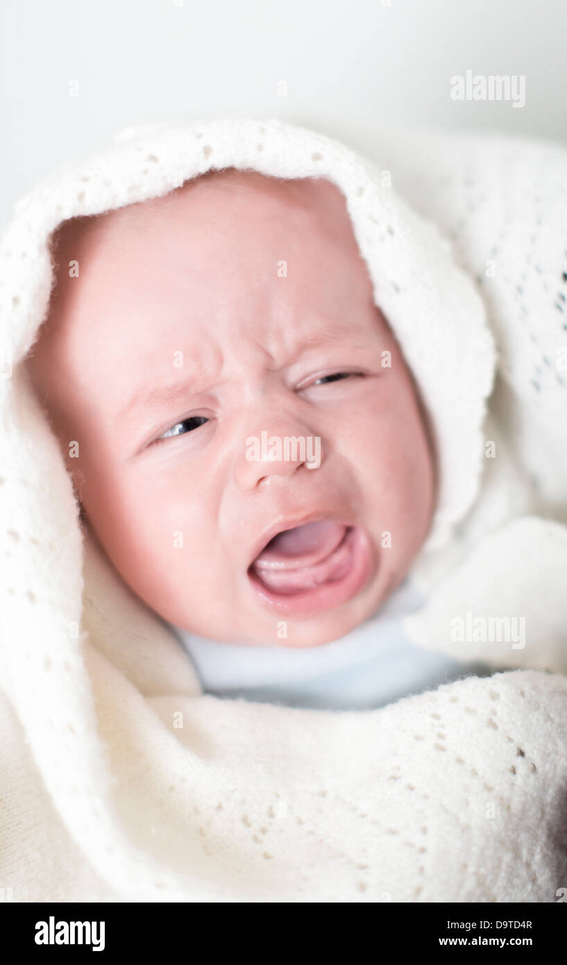 Baby, boy 3 months old, screaming Stock Photo