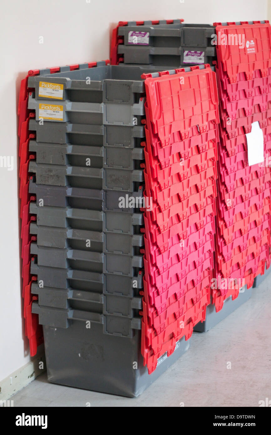 stack of red storage boxes Stock Photo