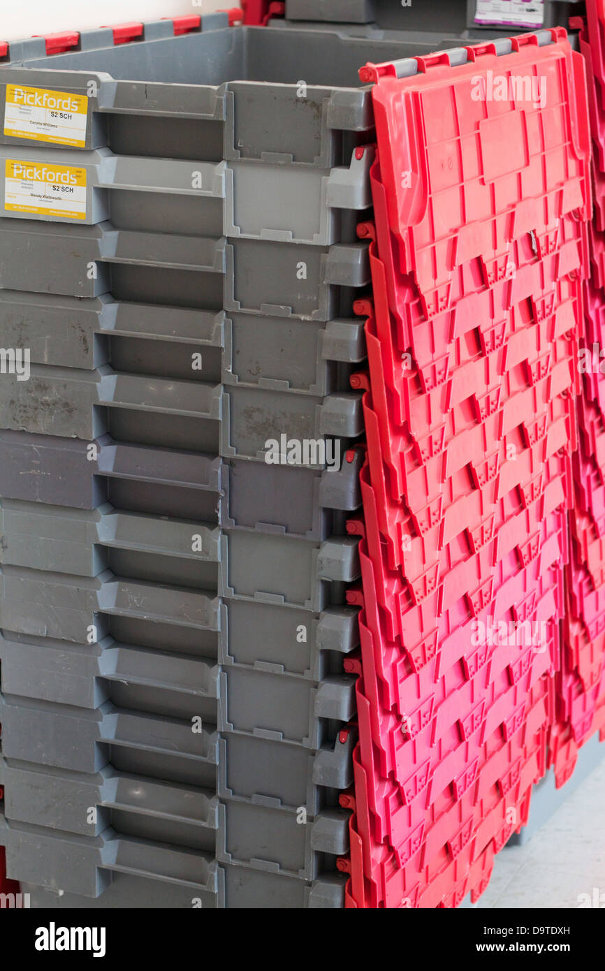 stack of red storage boxes Stock Photo