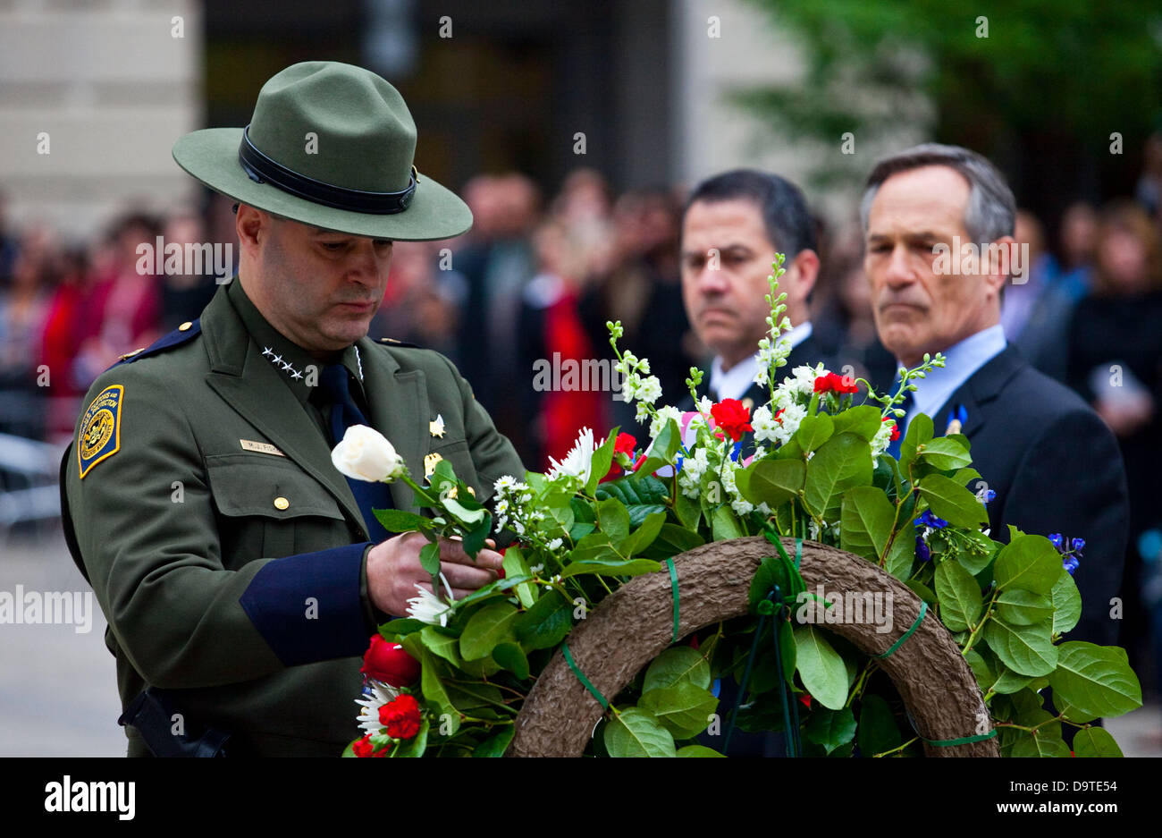 Border Patrol Chief Michael J. Fisher honors fallen agents with a white