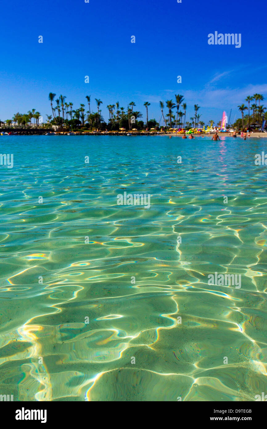 The beautiful waters of Anfi Beach in Gran Canaria Stock Photo