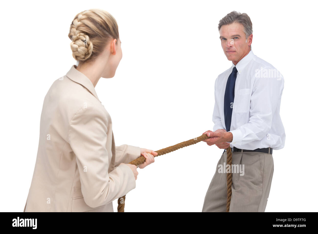 Business people compete a tug of war Stock Photo