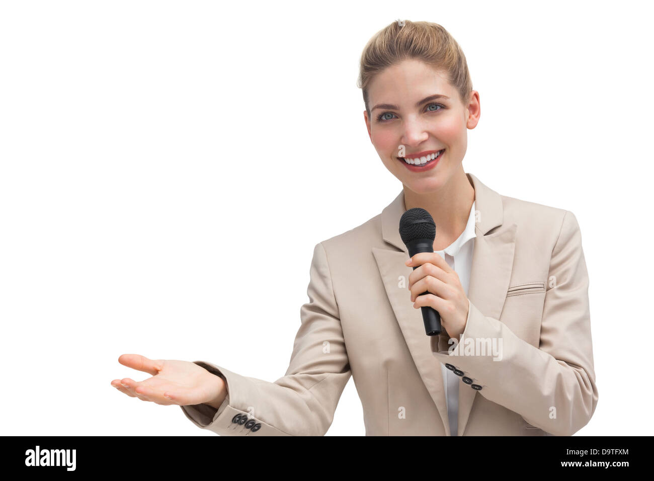 Businesswoman holding microphone Stock Photo