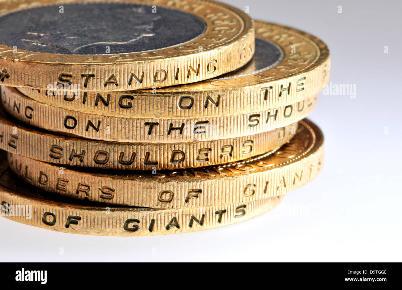 British £2 coin - writing around the edge - "Standing on the Shoulder of Giants" (Sir Isaac Newton) Stock Photo