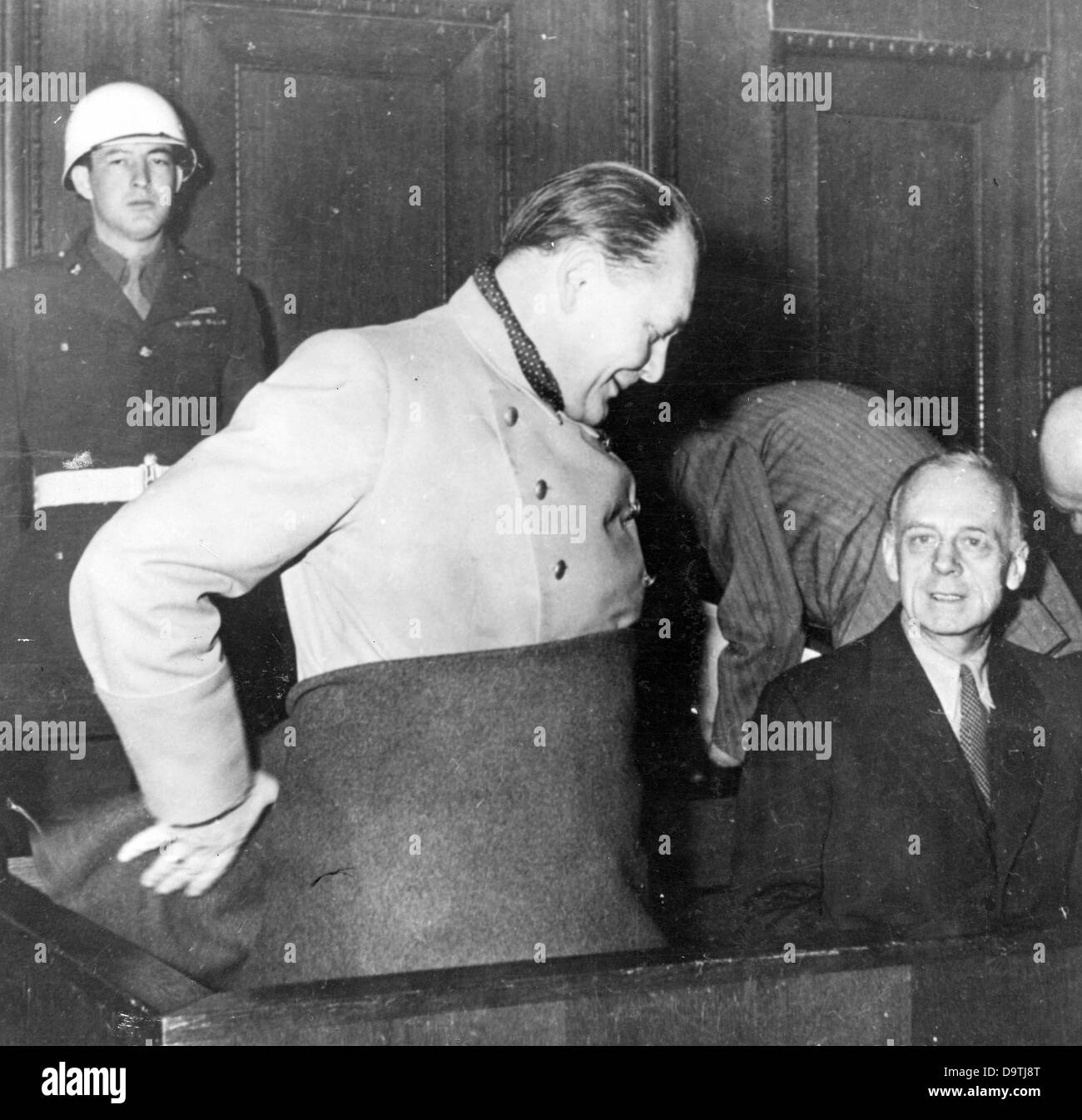 The Nazi war criminal Hermann Göring (l) and the former German Foreign Minister Joachim von Ribbertrop are pcitured in the dock during the Nuremberg Trials in the context of the International Military Tribunal against the major war criminals of World War II in Nuremberg, Germany, in 1946. The photo was taken by the Soviet photographer Yevgeny Khaldei, who was commissioned by the USSR to cover the trials. Photo: Yevgeny Khaldei Stock Photo