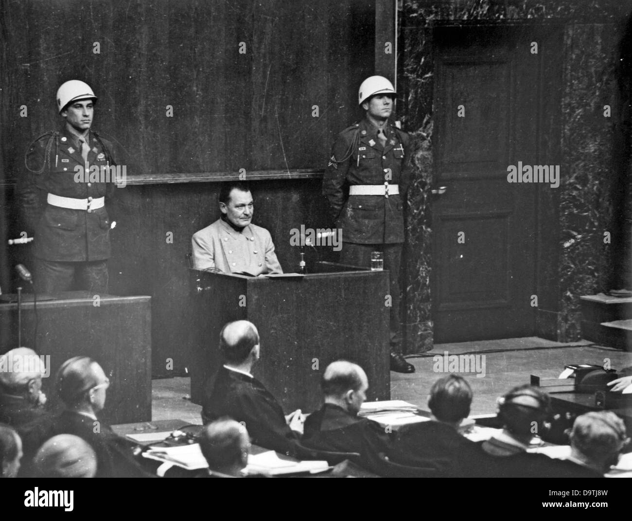 The Nazi war criminal Hermann Göring (m) is pictured in the dock during the Nuremberg Trials in the context of the International Military Tribunal against the major war criminals of World War II in Nuremberg, Germany, in 1946. The photo was taken by the Soviet photographer Yevgeny Khaldei, who was commissioned by the USSR to cover the trials. Photo: Yevgeny Khaldei Stock Photo