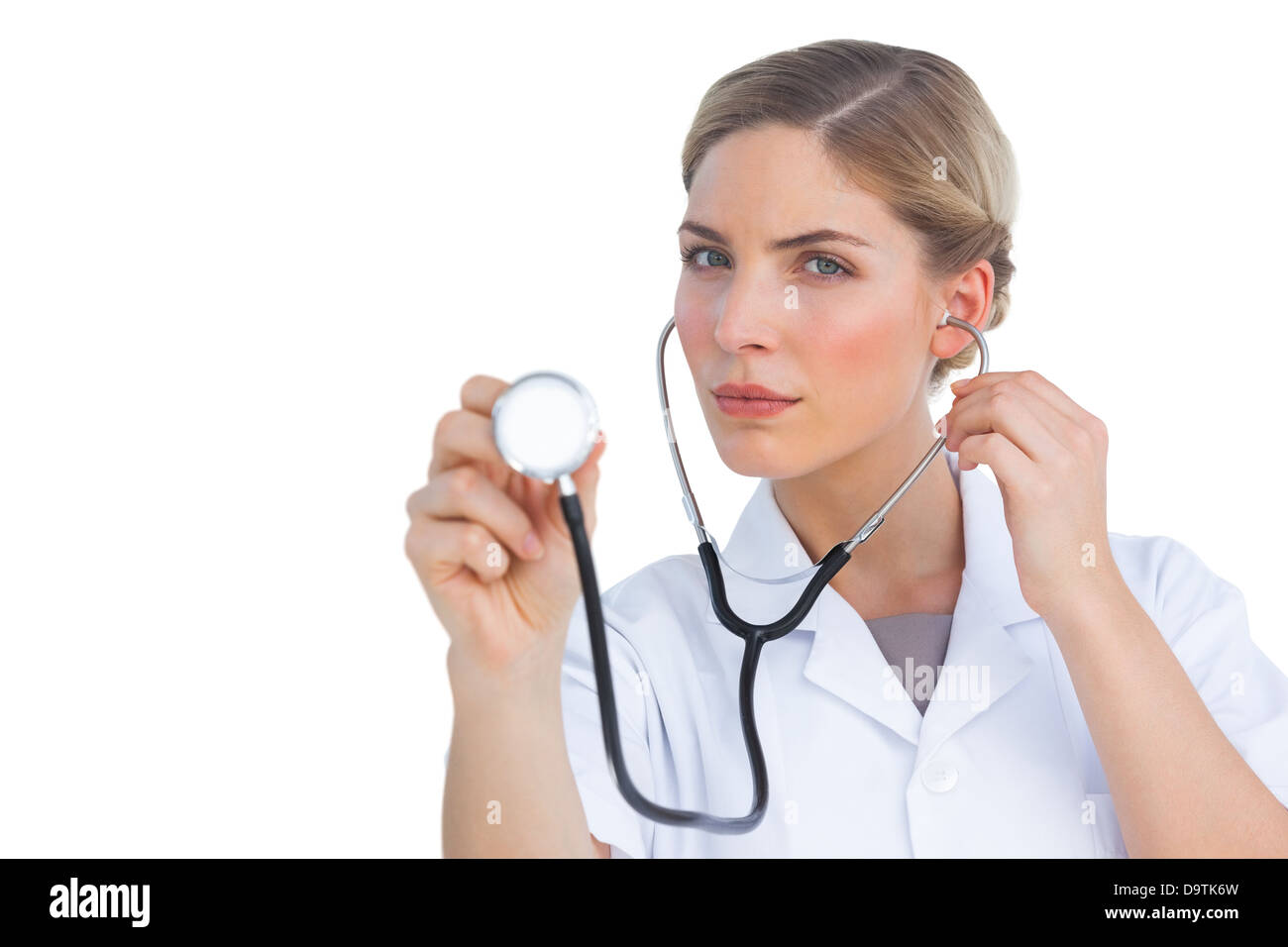 Nurse listening with stethoscope Stock Photo Alamy