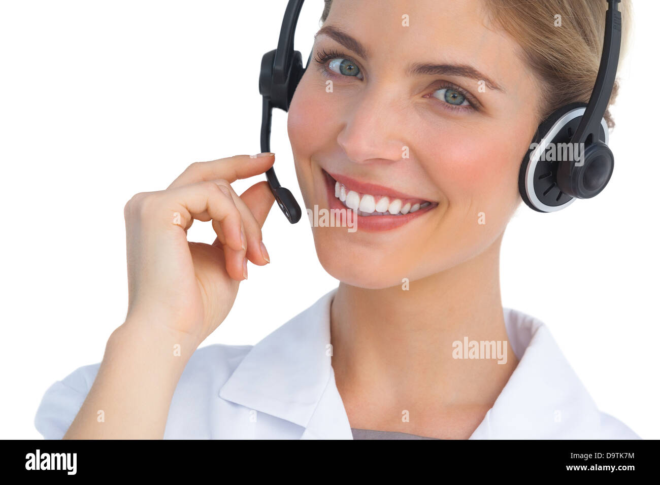 Happy nurse working with headset Stock Photo