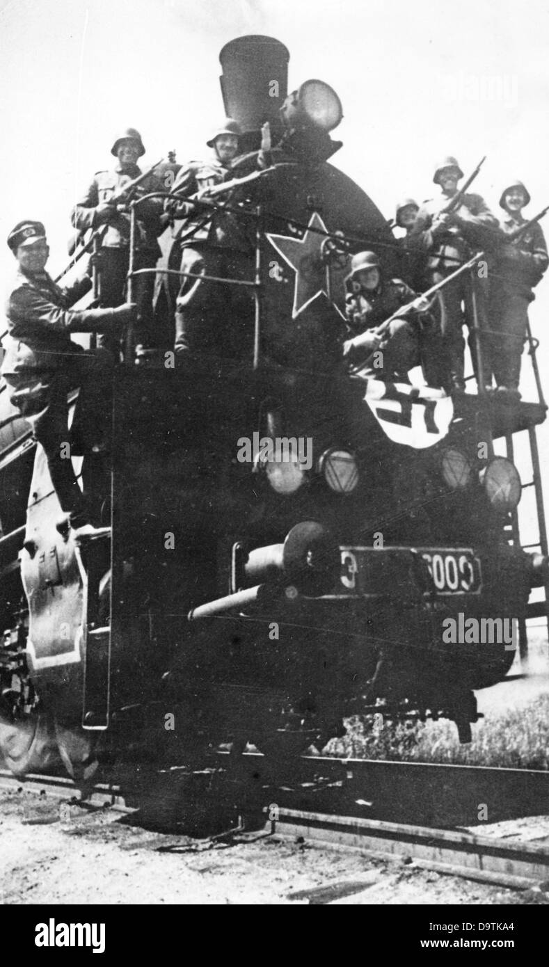 The Nazi Propaganda! on the back of the image reads: 'Soviet trains run for us! A heavy transportation train decorated with a swastica flag and secured from assaults travels towards the front line, which is already located deep in the Soviet Union.' Image from the Eastern Front, published 4 August 1941. The attack of the Soviet Union by the German Reich was agreed on in July 1940 and prepared in December 1940 as the 'Operation Barbarossa'. On 22 June 1941, the invasion by the German Wehrmacht started. Fotoarchiv für Zeitgeschichte Stock Photo