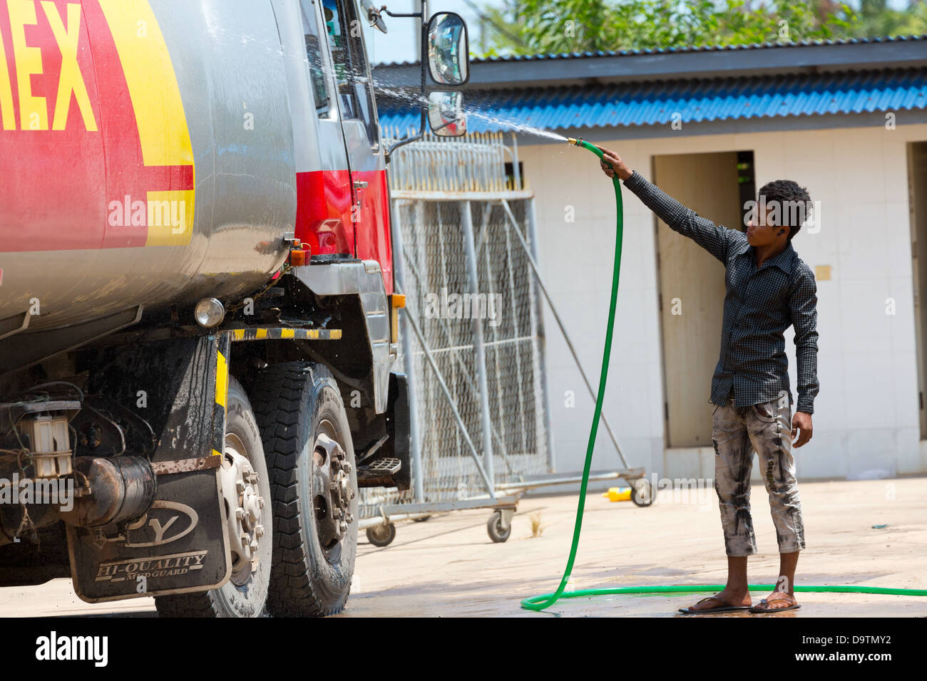 Man cleaning a Petrol Truck in Kampot, Cambodia Stock Photo Alamy