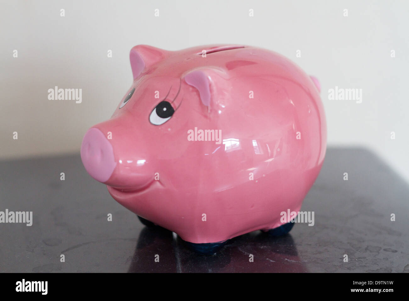 Pink piggy bank Stock Photo - Alamy