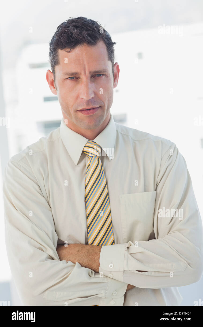 Businessman with crossed arms Stock Photo Alamy