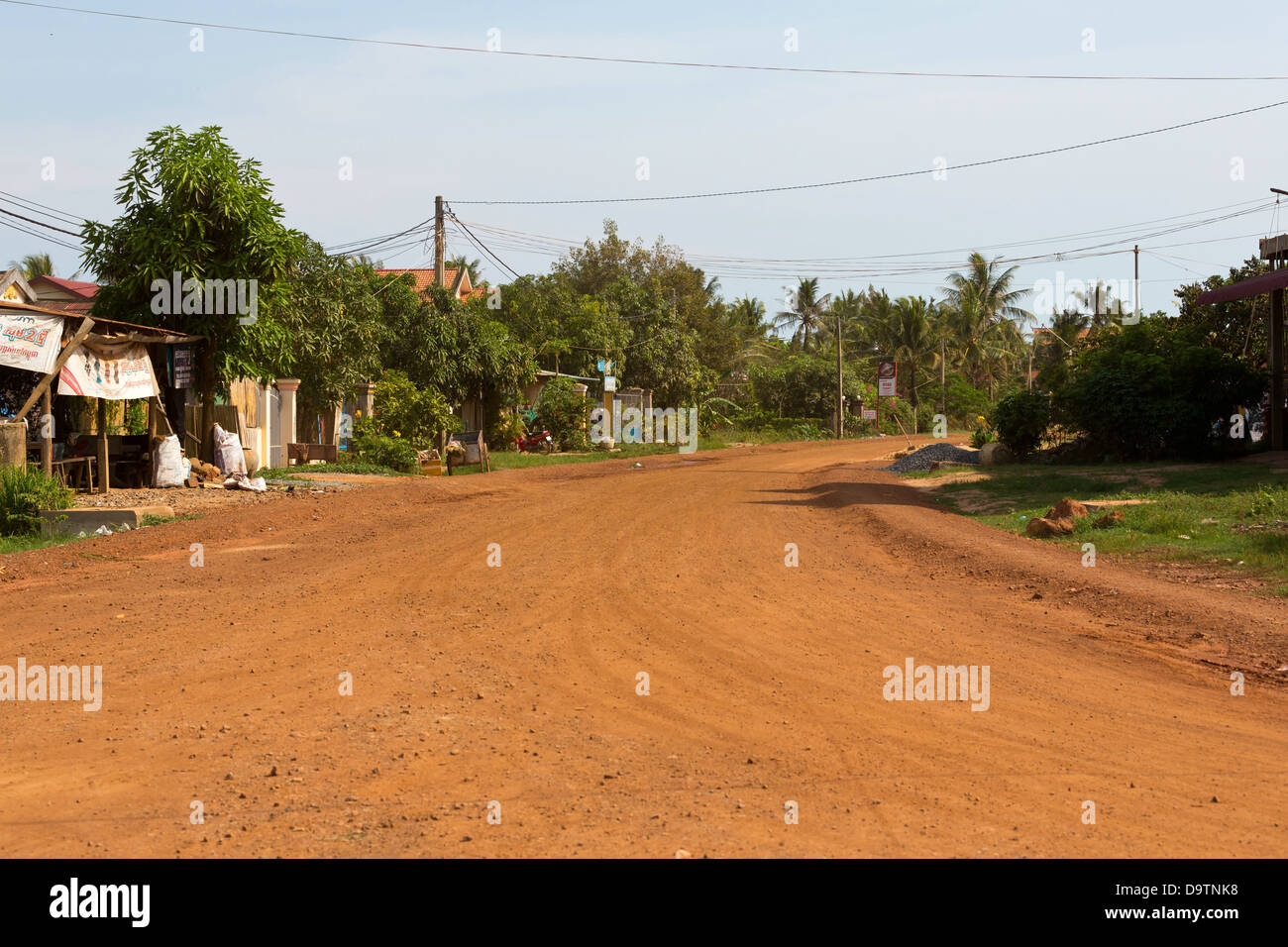 Dusty Country Road in the Province of Kampot, Cambodia Stock Photo