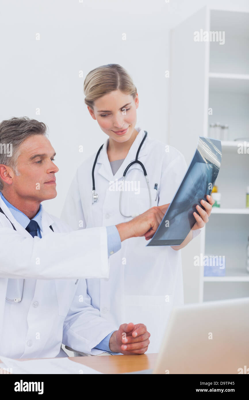 Doctor pointing a radiography Stock Photo