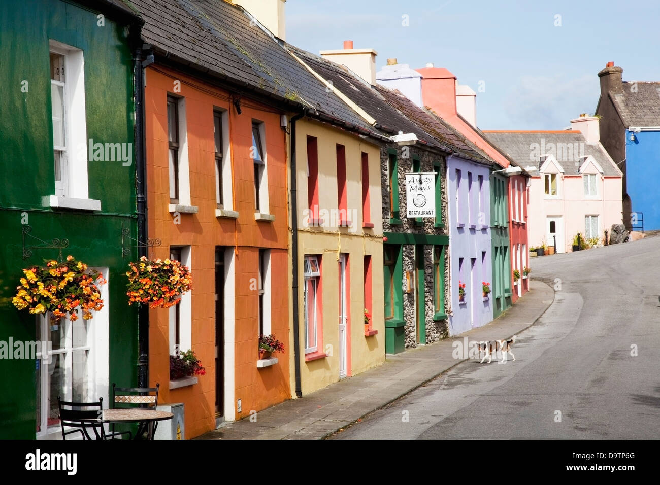 Colourful houses in a row along a street;Eyeries county cork ireland
