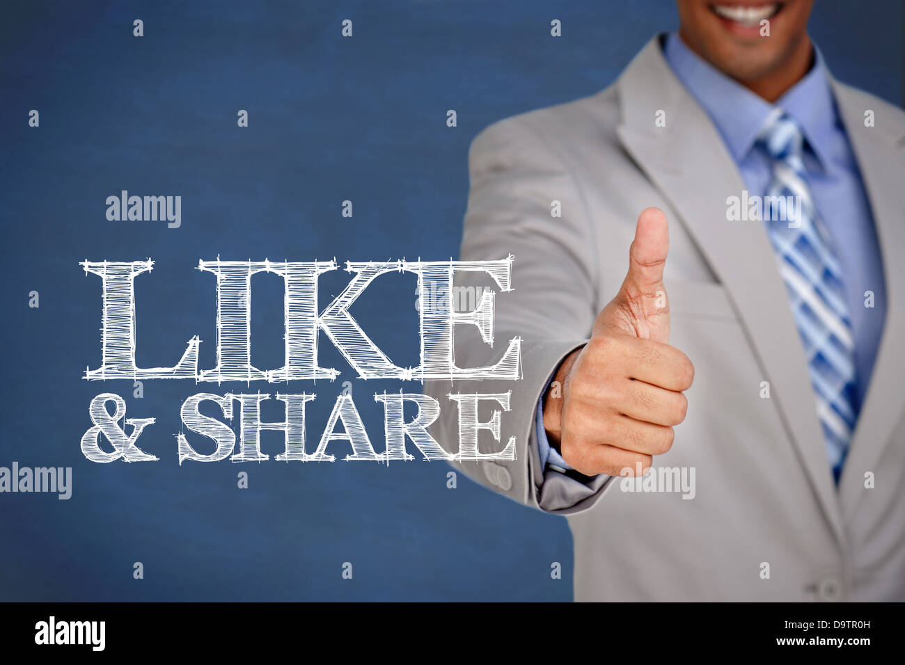 Like and share written next to a businessman Stock Photo