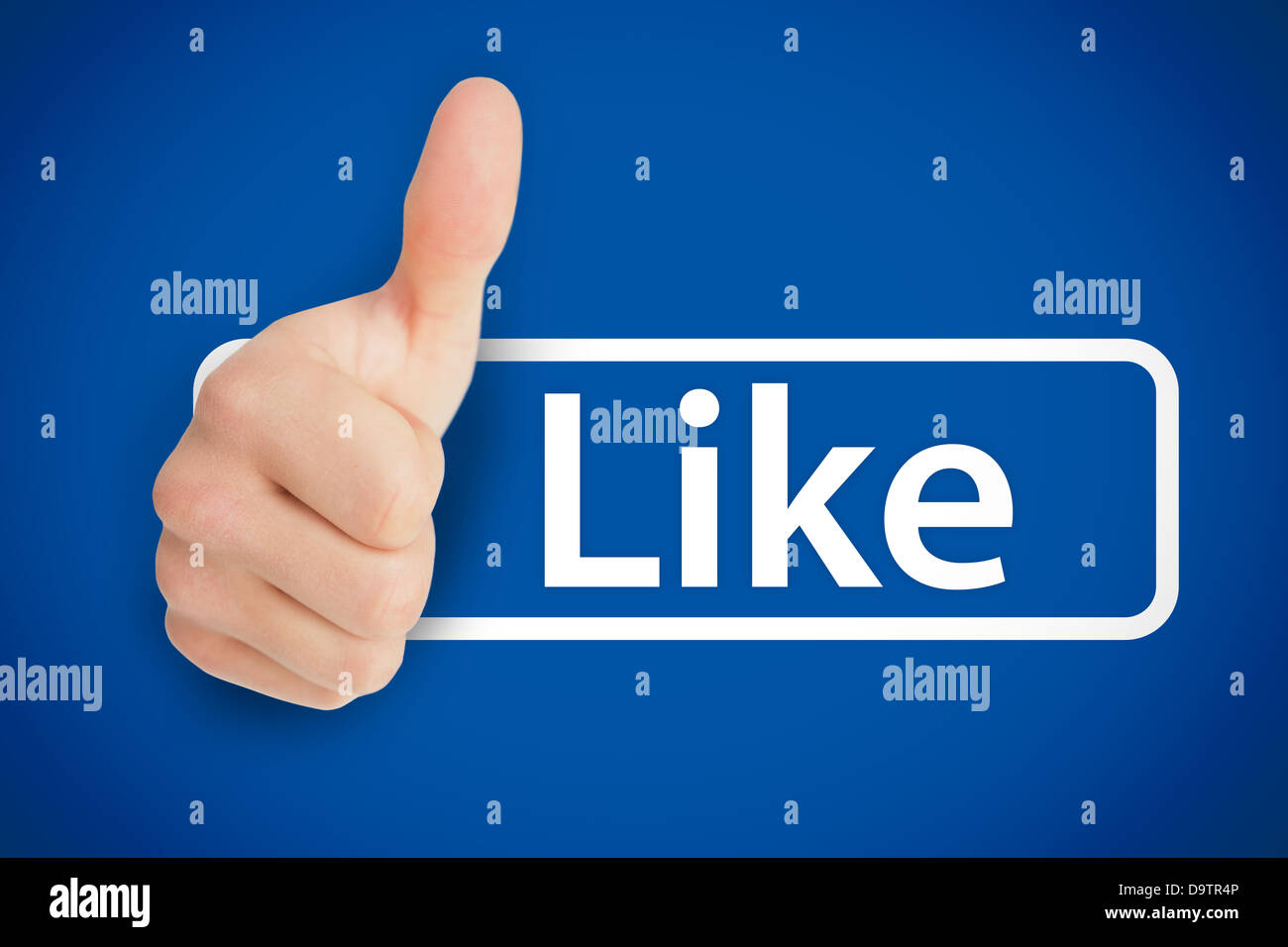 Real thumb up next to the like from social networks Stock Photo