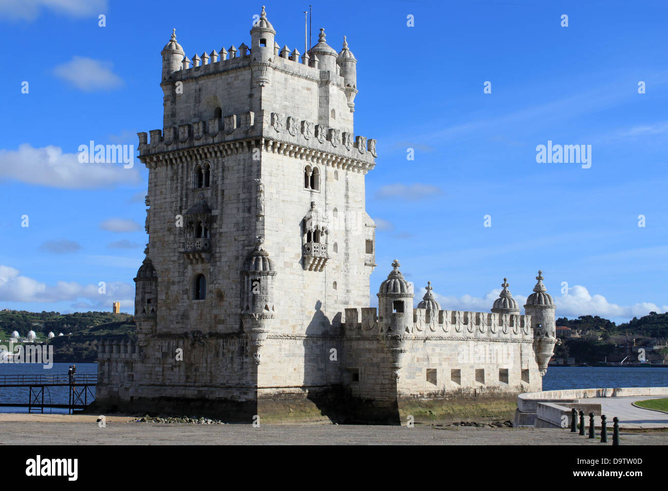 Torre de Belem, Lisbon Portugal displaying Manueline architecture with bright blue sky Stock Photo