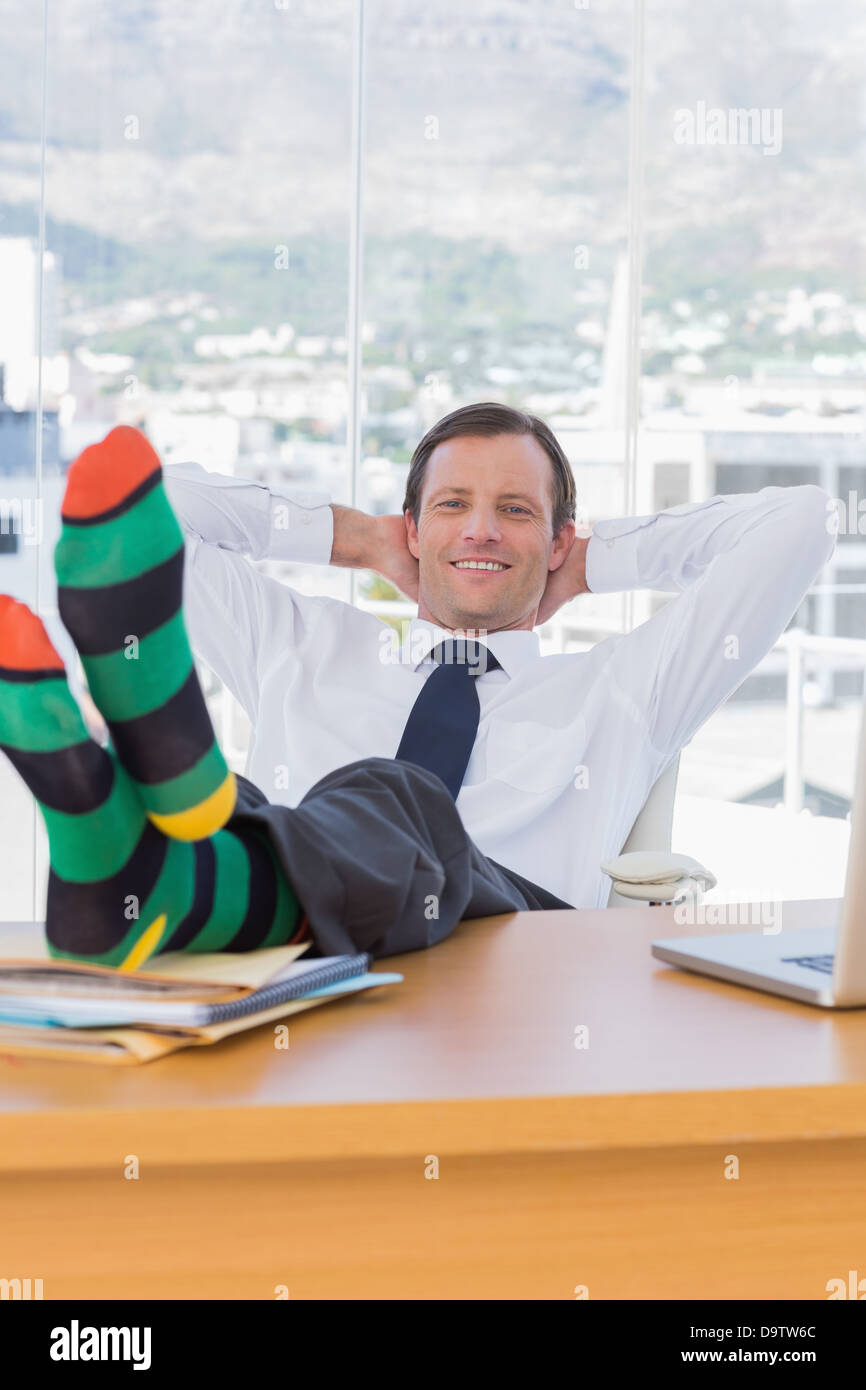 Man with feet on his desk hi-res stock photography and images - Alamy