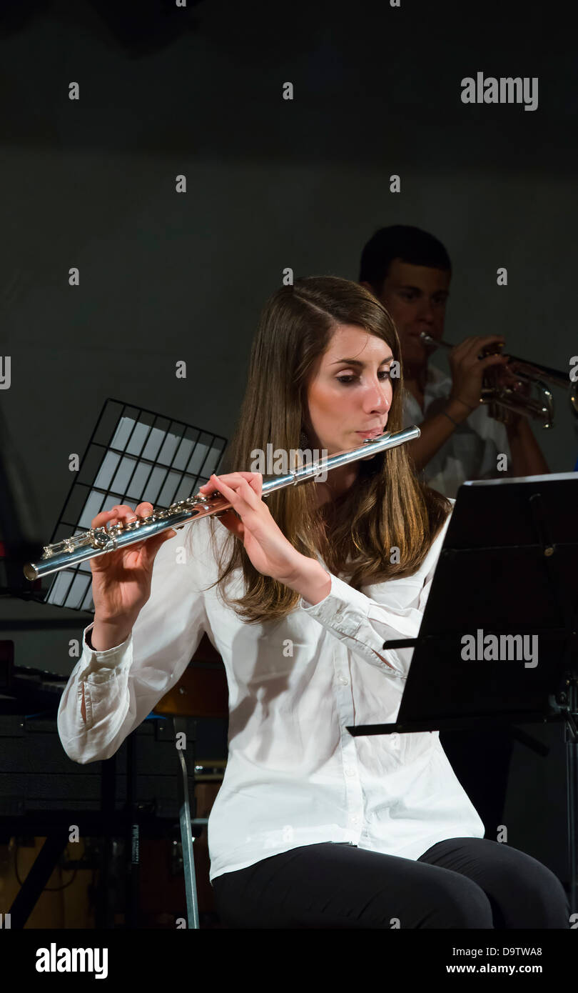 woman playing flute Stock Photo