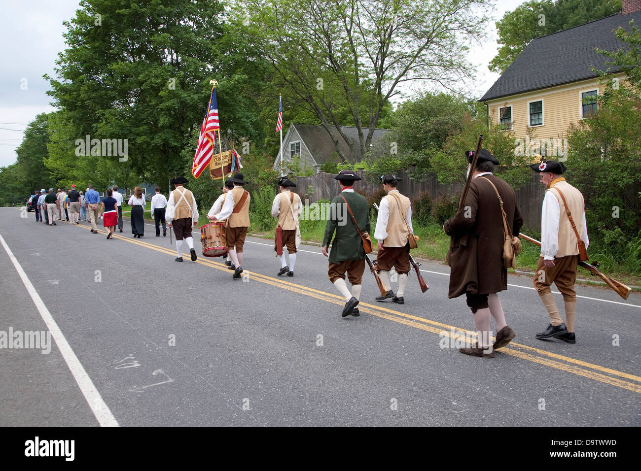 Concord Minutemen Revolutionary reenactors march down road to Concord, MA on Memorial Day, 2011 Stock Photo