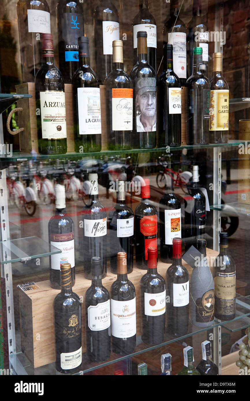 bottles of spanish wine on window display in a store in barcelona catalonia spain Stock Photo
