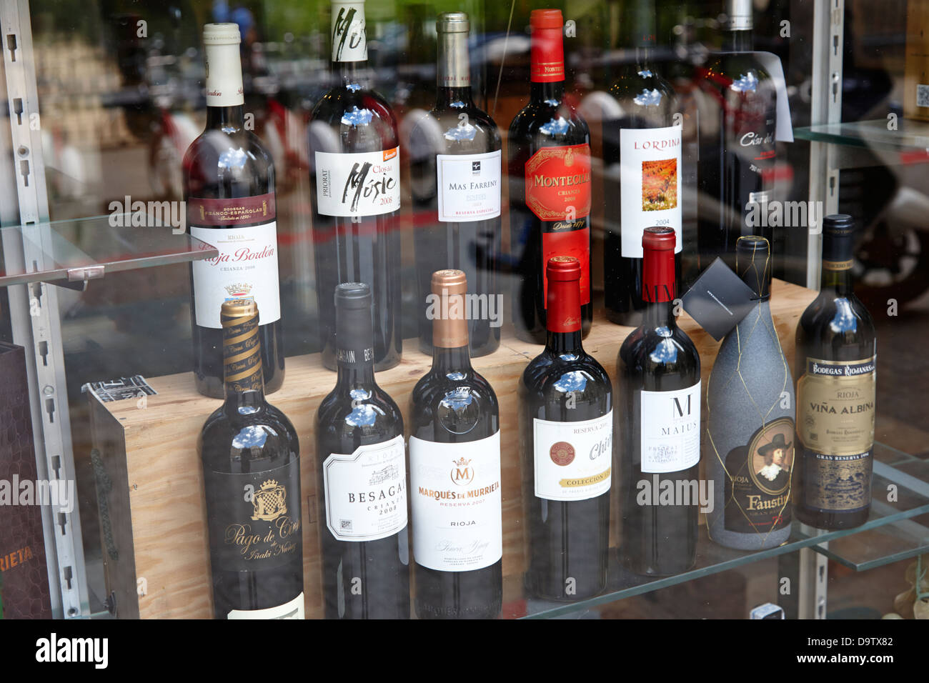 bottles of spanish wine on window display in a store in barcelona catalonia spain Stock Photo