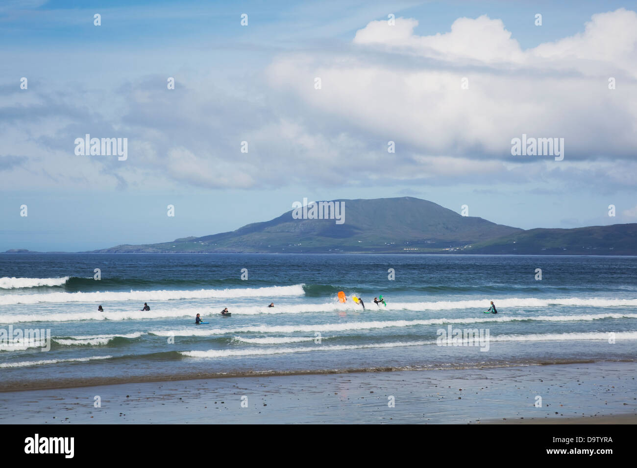 Surfers on canuski beach near louisburgh;County mayo ireland Stock Photo