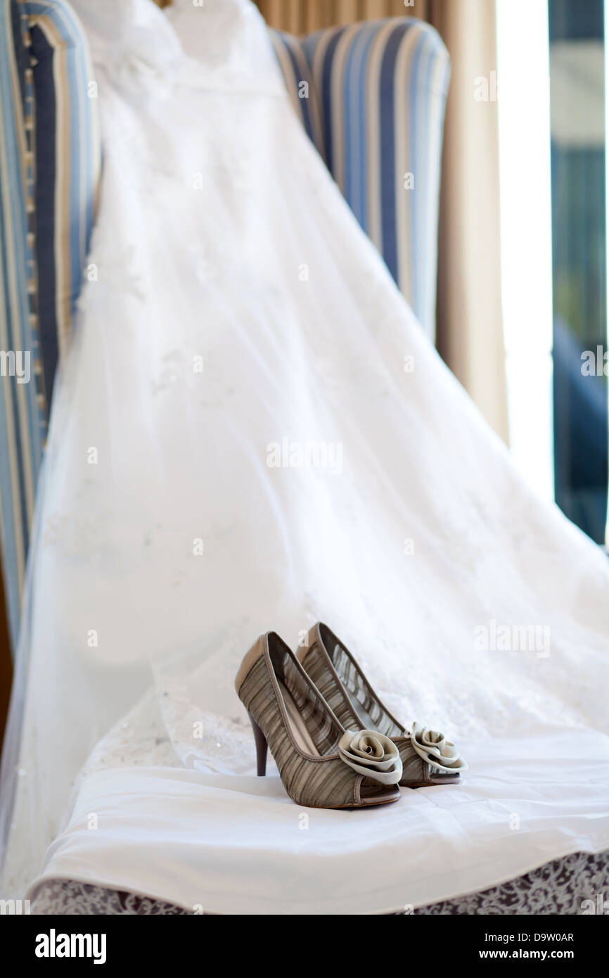 wedding dress and shoes for the bride Stock Photo - Alamy