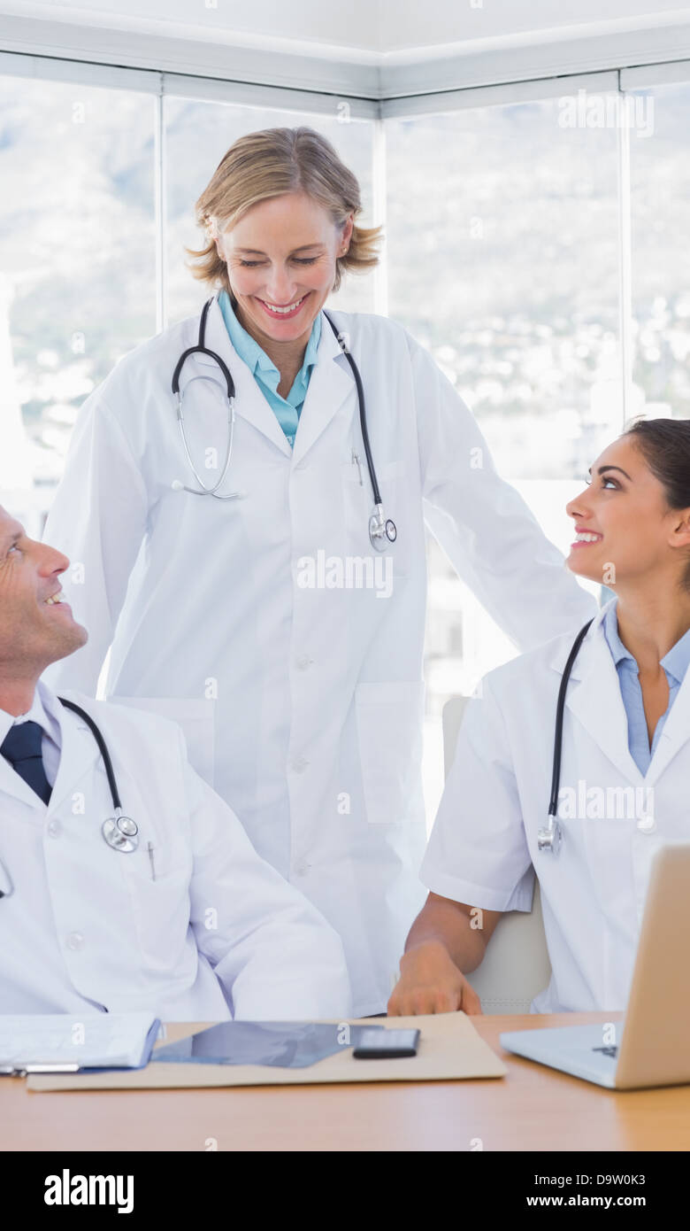 Smiling medical staff working together Stock Photo