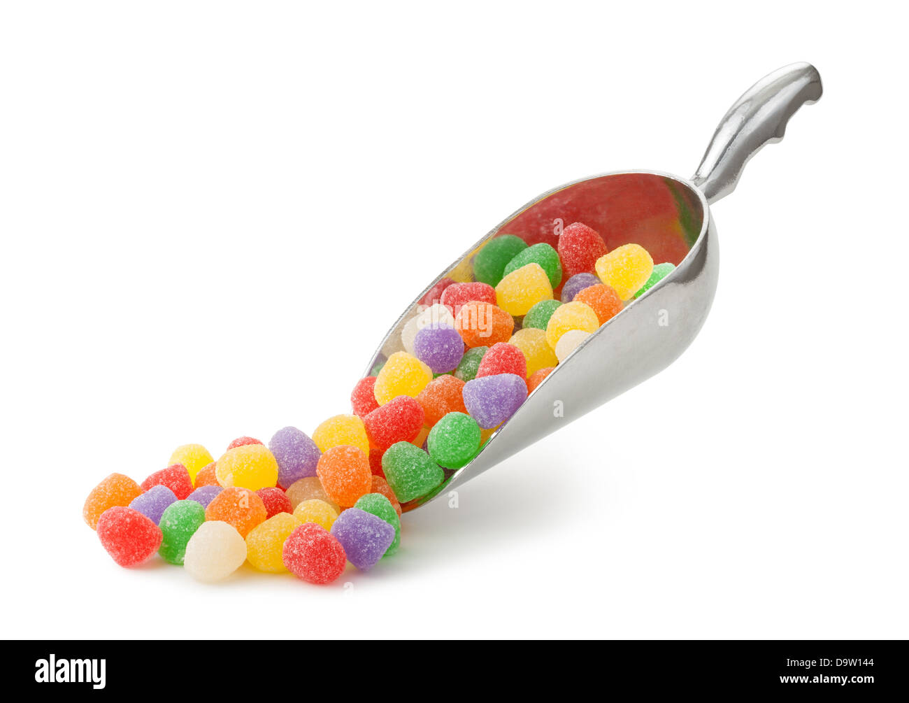 Assorted Gumdrops in a scoop isolated on a white background. Stock Photo