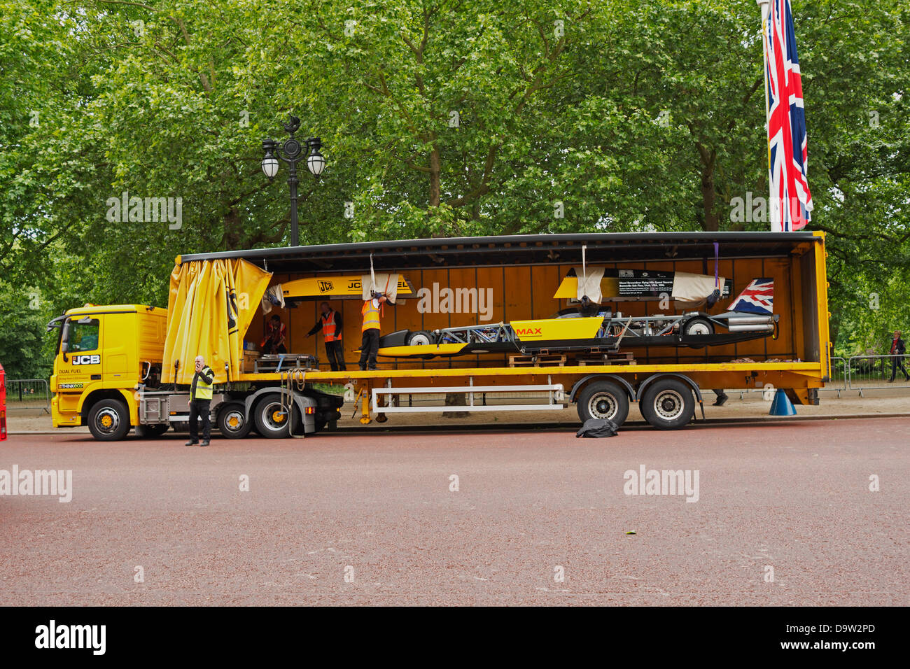 The JCB dieselmax streamliner inside an open-sided lorry on The Mall, London. Stock Photo