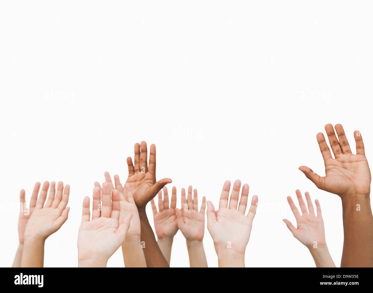 Hands raising in the air Stock Photo