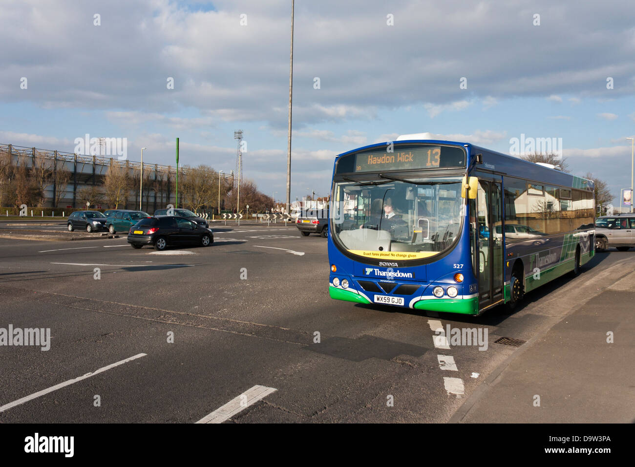 Cars and buses negotiate the five mini-roundabouts at the notorious Magic Roundabout in Swindon. Stock Photo