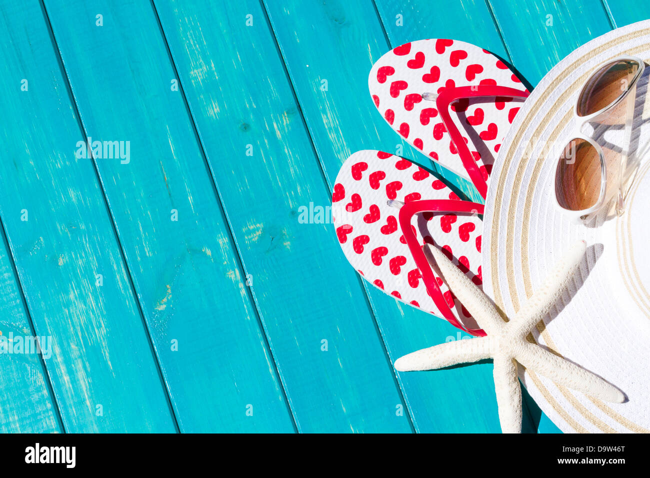 Colorful flip flops by a swimming pool Stock Photo - Alamy