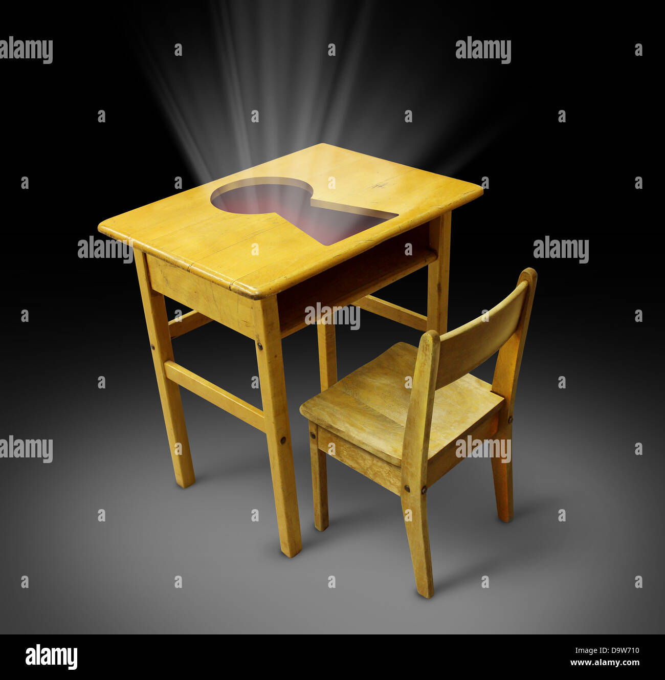 Key to education concept with an old school desk and student chair with a key hole on the table as a symbol of career opportunity through the power of knowledge and training for new business skills. Stock Photo