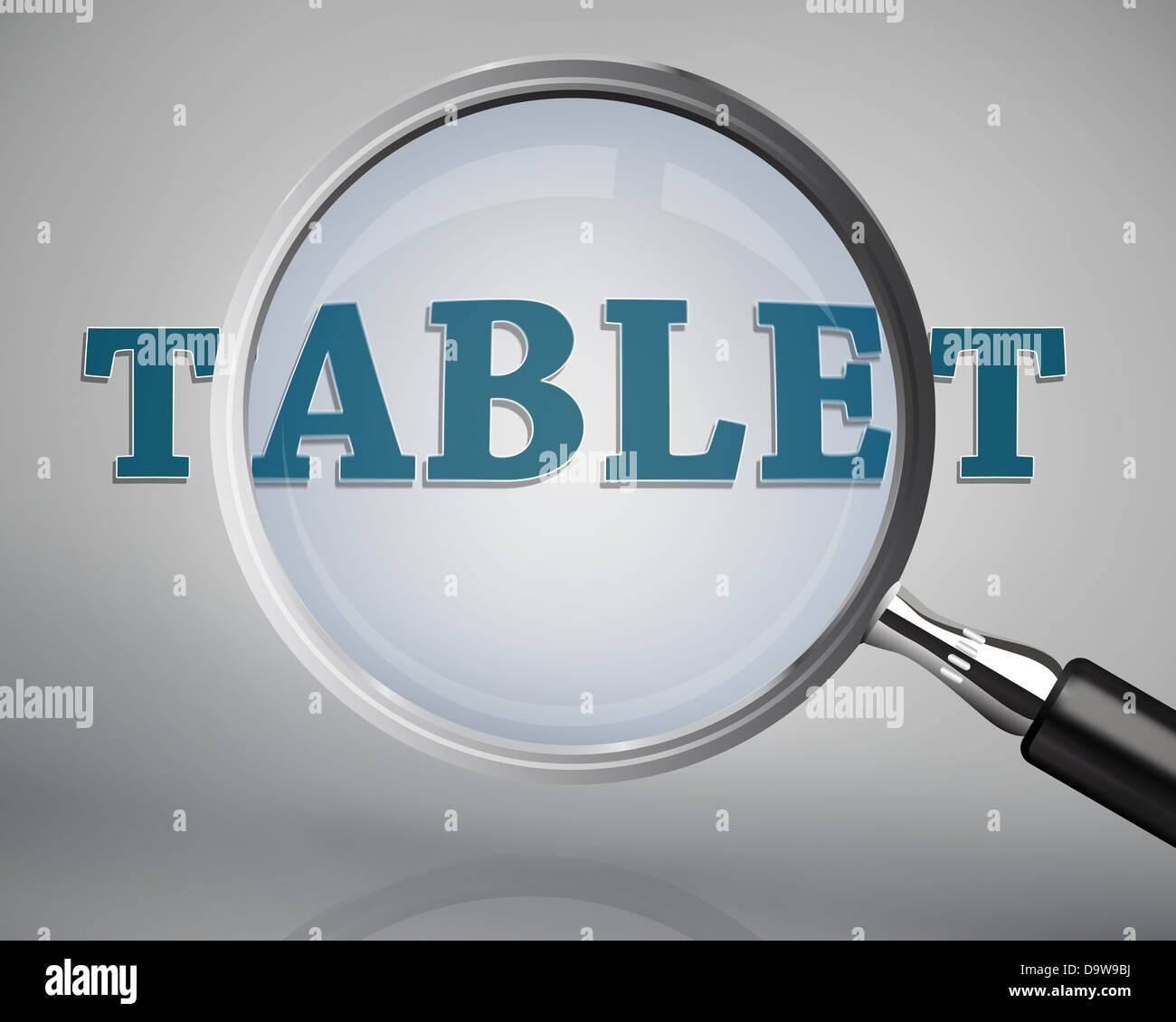Magnifying glass showing tablet word Stock Photo Alamy