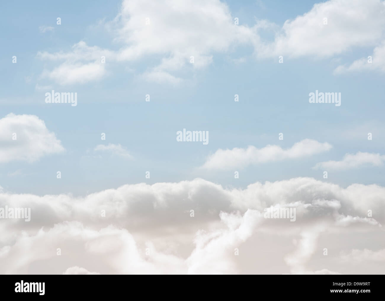 Clouds under a bright blue sky Stock Photo - Alamy