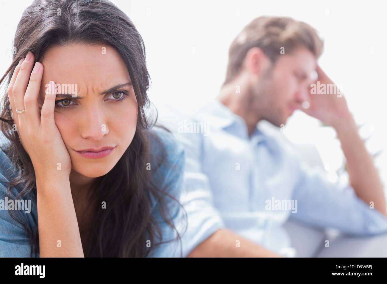 Irritated woman holding her head Stock Photo