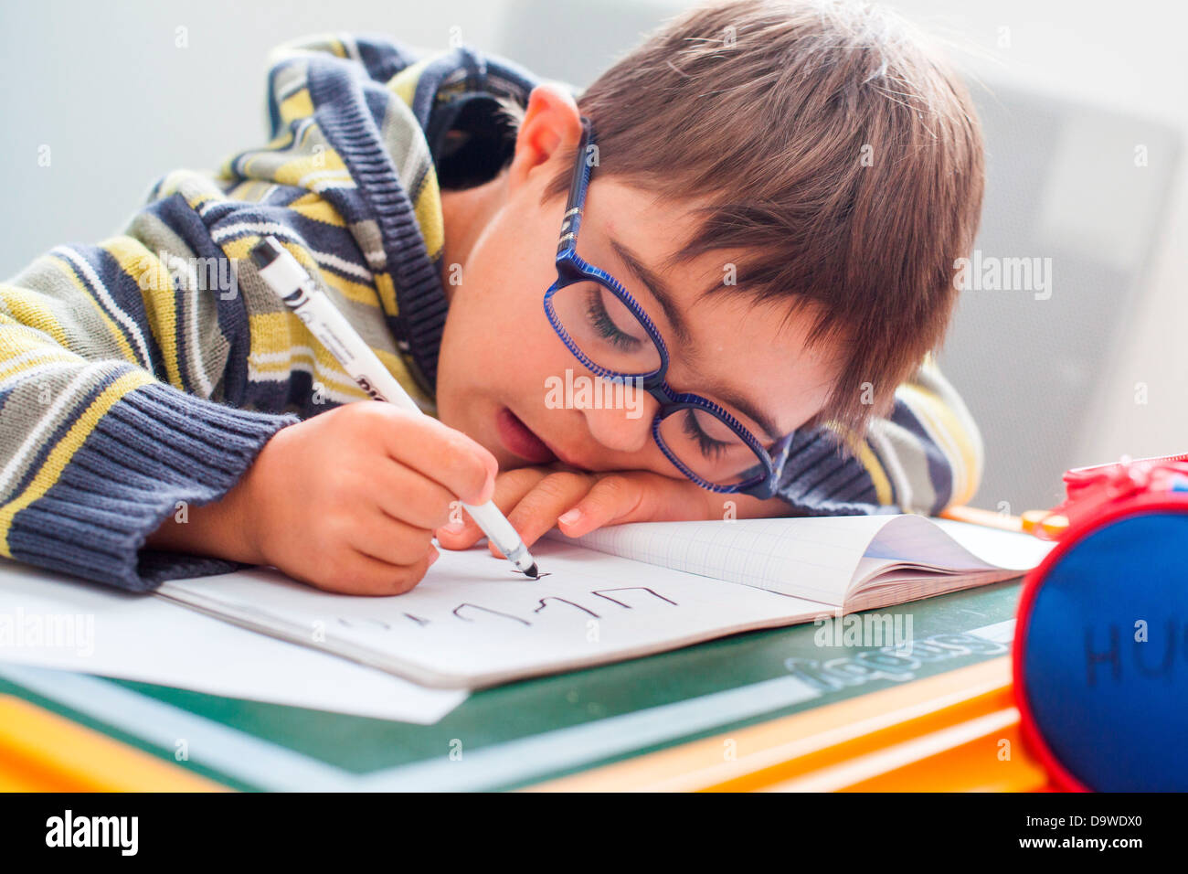 Handicapped kid writing hires stock photography and images Alamy