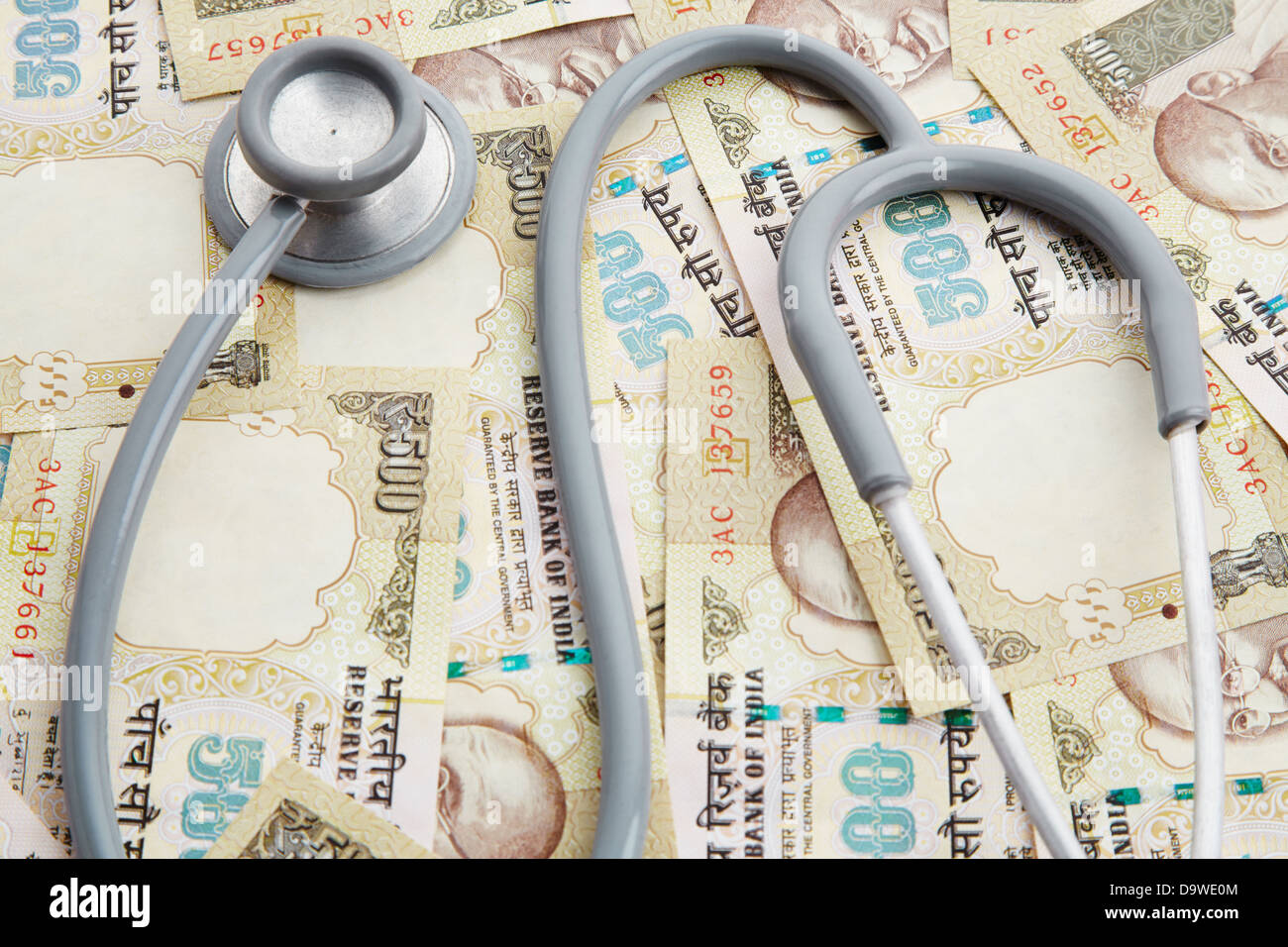 Top view of a stethoscope on Indian five hundred rupee notes Stock