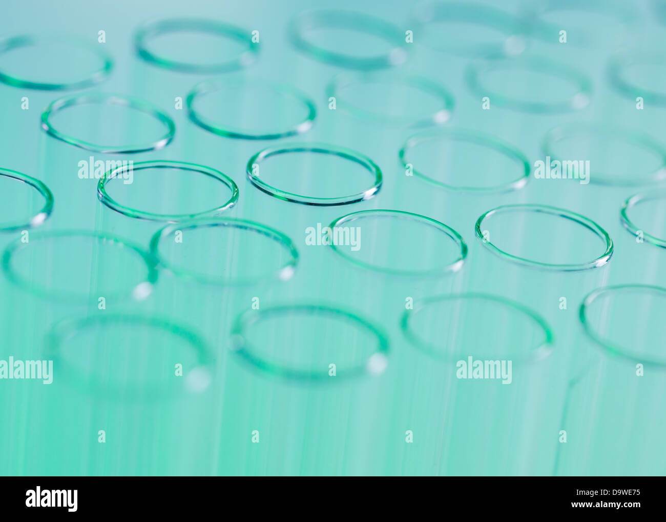 Close up of a large group of opened cylindrical glass labware Stock