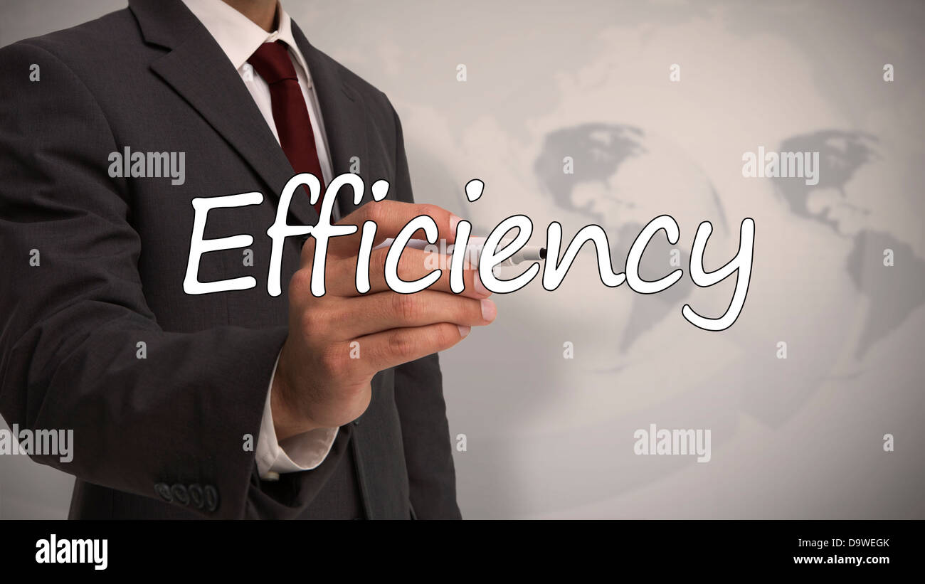 Businessman writing the word efficiency Stock Photo